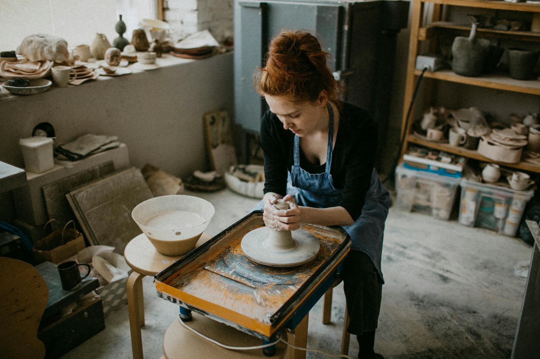 You Are the Voice Behind the Vision woman holding clay