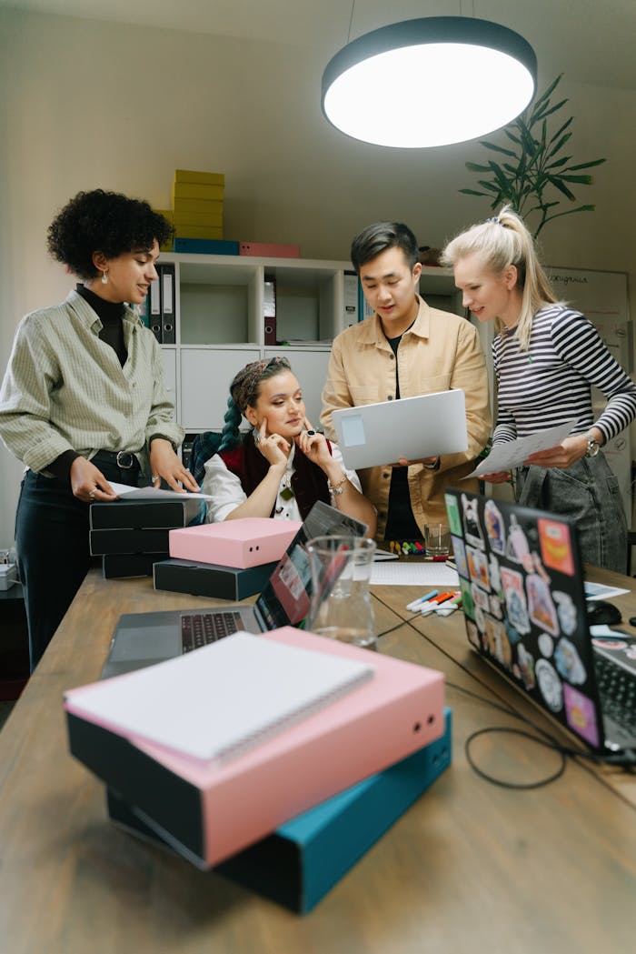 About Diverse team of professionals planning a project in a modern office meeting.